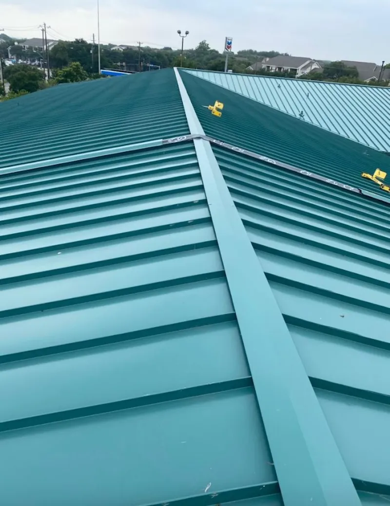 Green commercial metal roof ridge and valley for Metal Roof Repair in Albuquerque