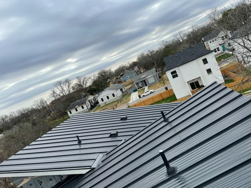 Standing seam metal roof panels with vents for Skylight Repair in Albuquerque